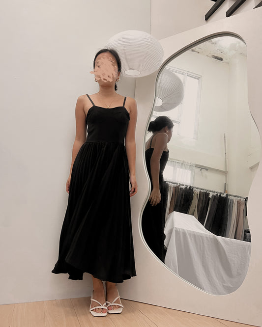 black bustier style pleated dress