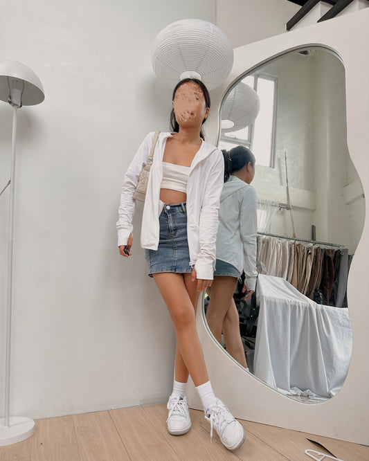 white windbreaker