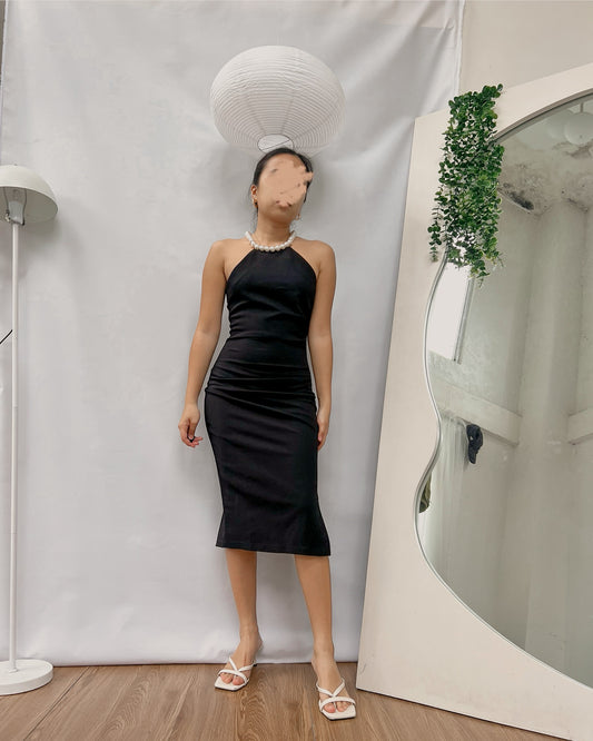 black body hugging with pearl straps halter style dress