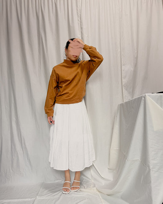 UNIQLO rustic orange turtle neck pullover