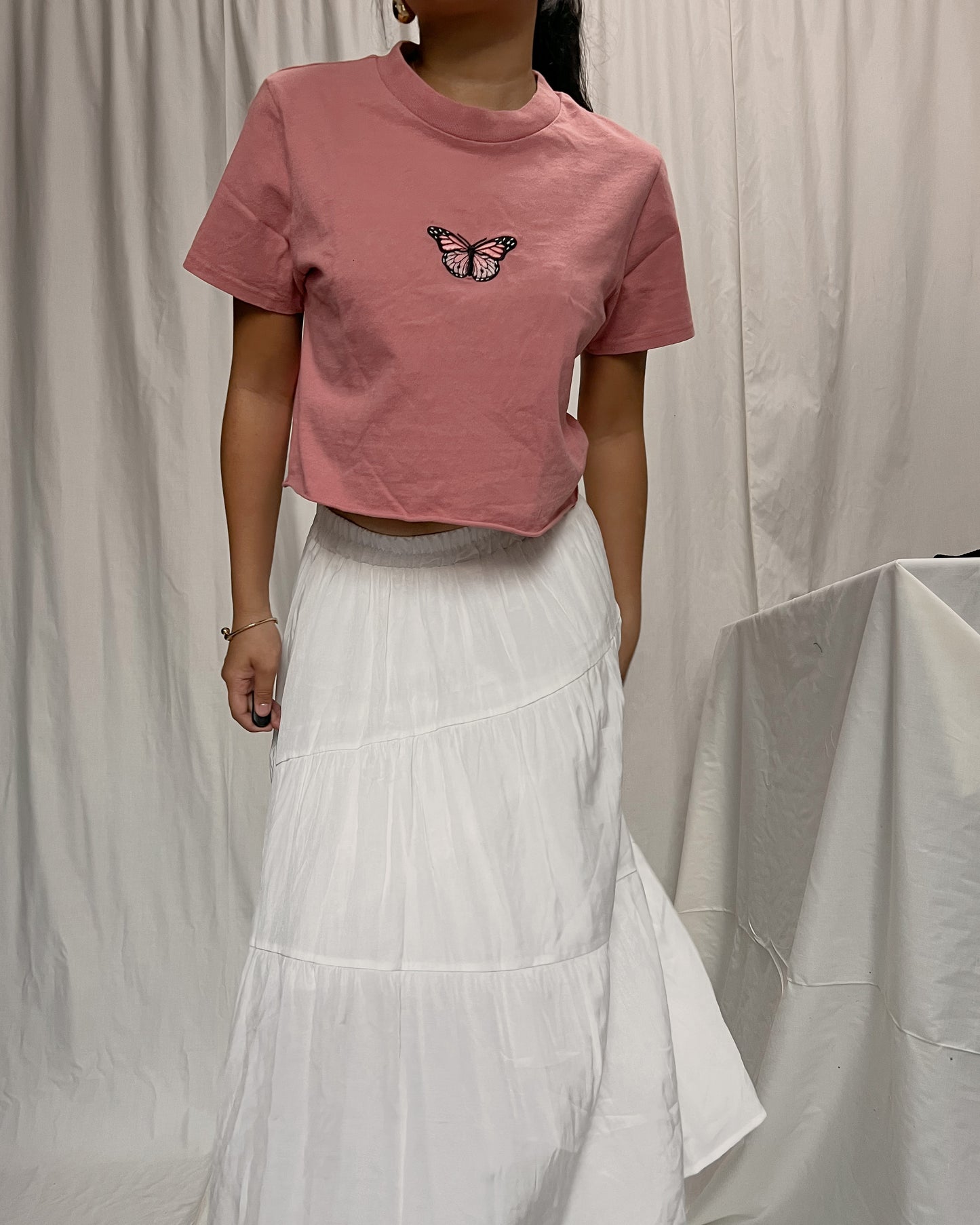 GU pink cropped with butterfly embossed print