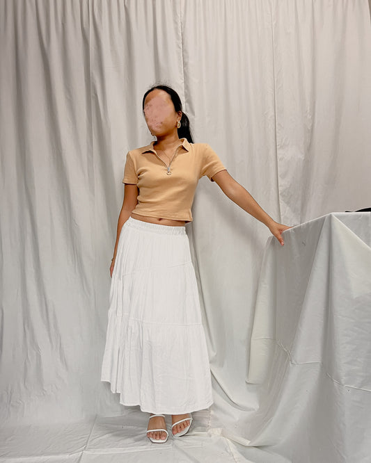 pastel orange ribbed zip up collared top