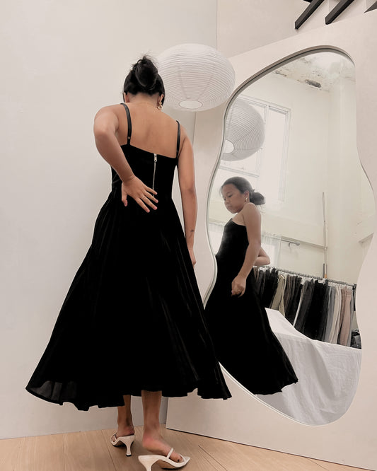 black bustier style pleated dress