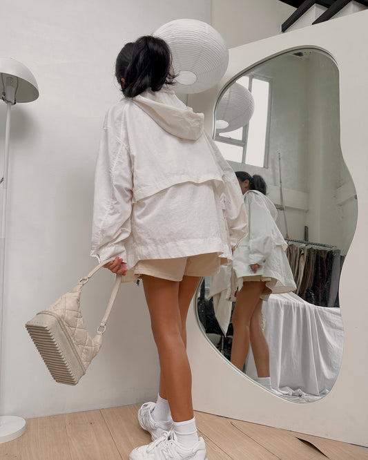 white zip up linen like jacket