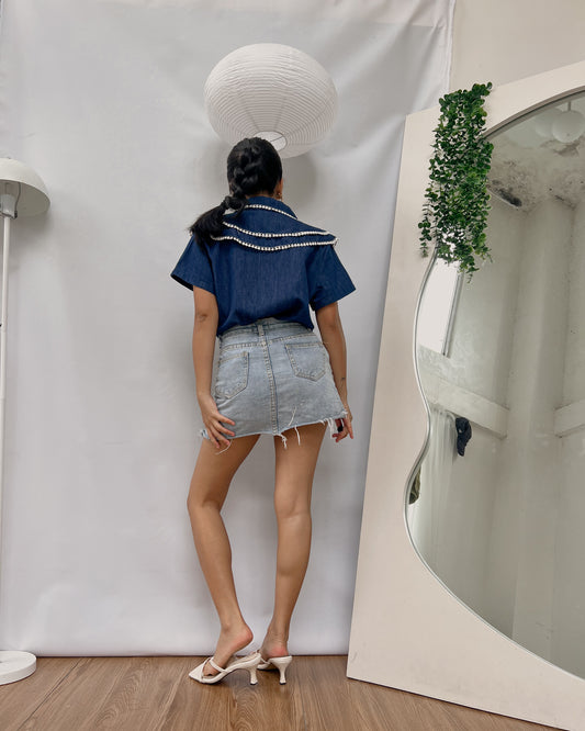 dark blue top with  white hemline and shoulder flaps T482