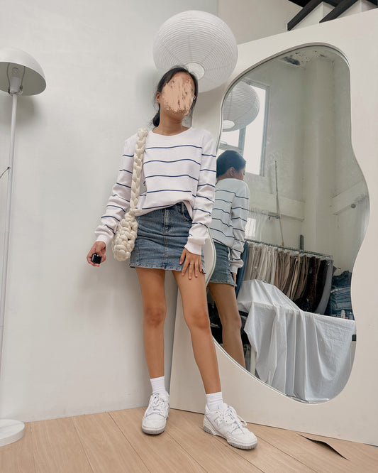 white pullover with horizontal lines