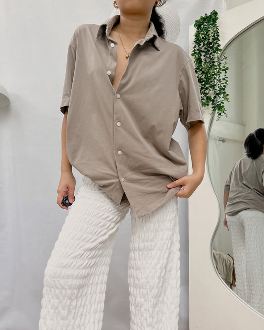 UNIQLO grayish brown button down collared top