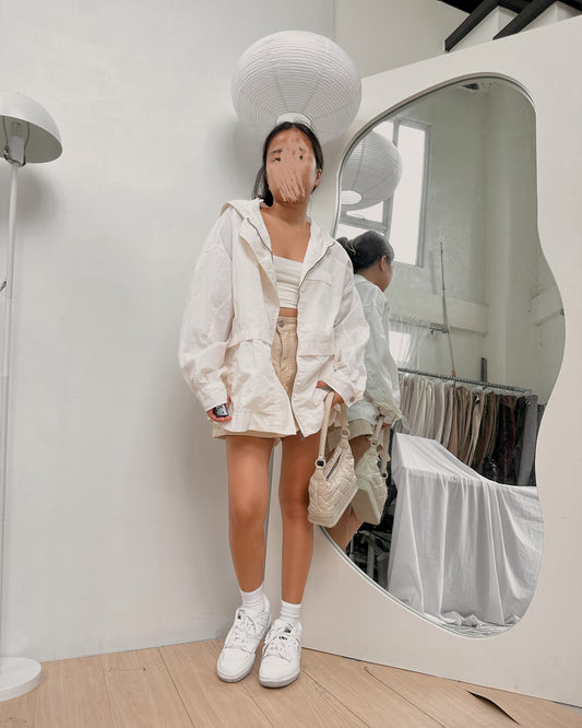 white zip up linen like jacket