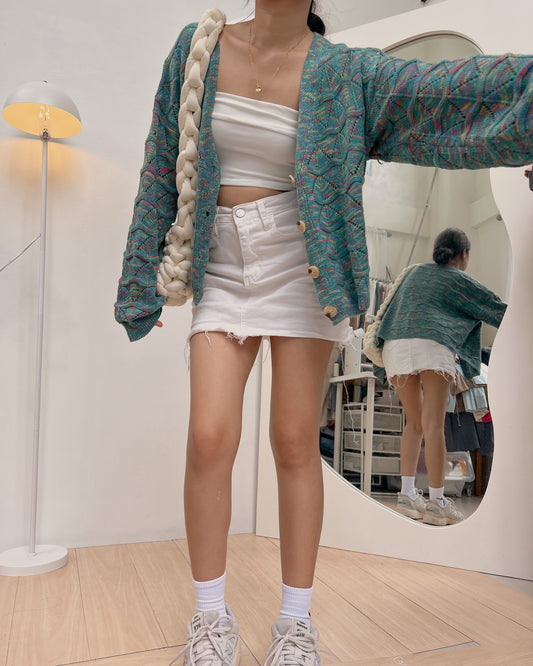 69. dark emerald green cardigan with pop of colors