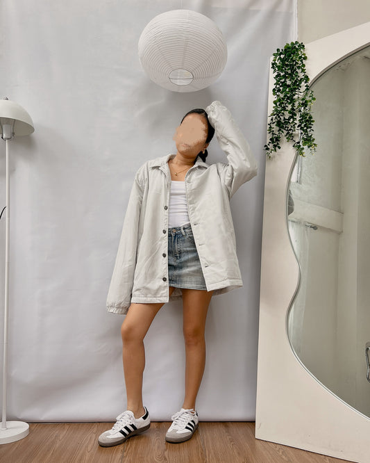 light blue puffy oversized button down jacket