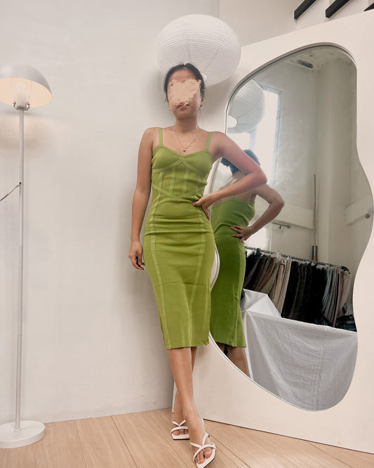 avocado green body hugging dress with boning