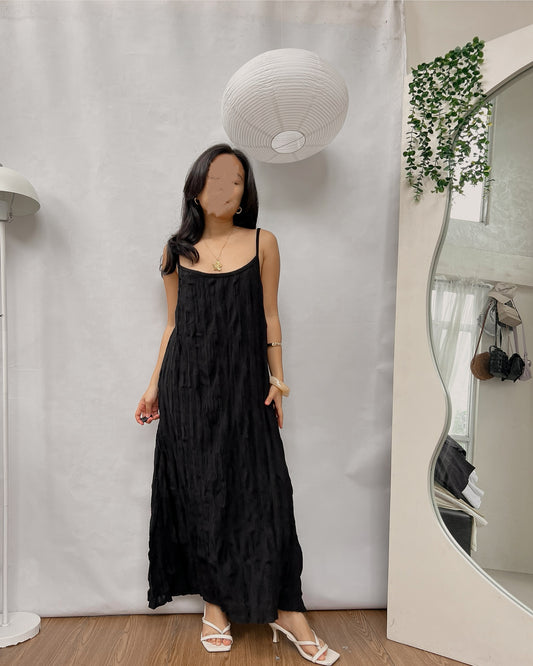 black sleeveless textured long dress