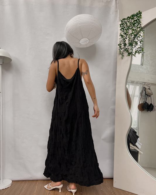 black sleeveless textured long dress