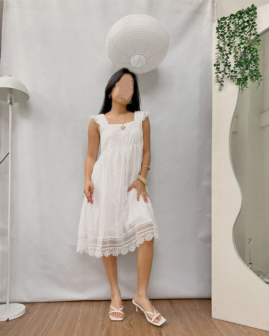 white embroidered back tie dress