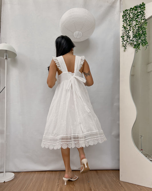 white embroidered back tie dress