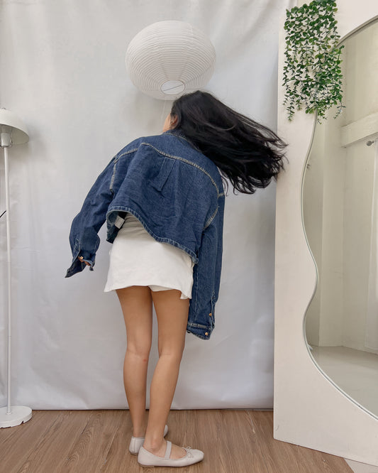 dark washed denim jacket with one pocket