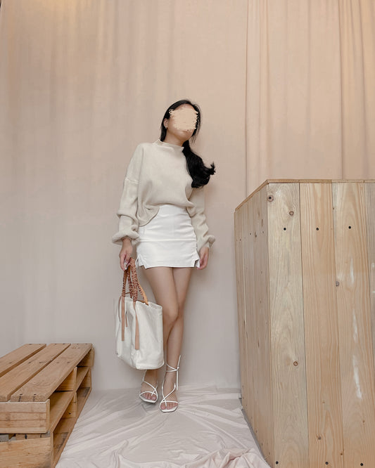 Cream colored knitted pullover
