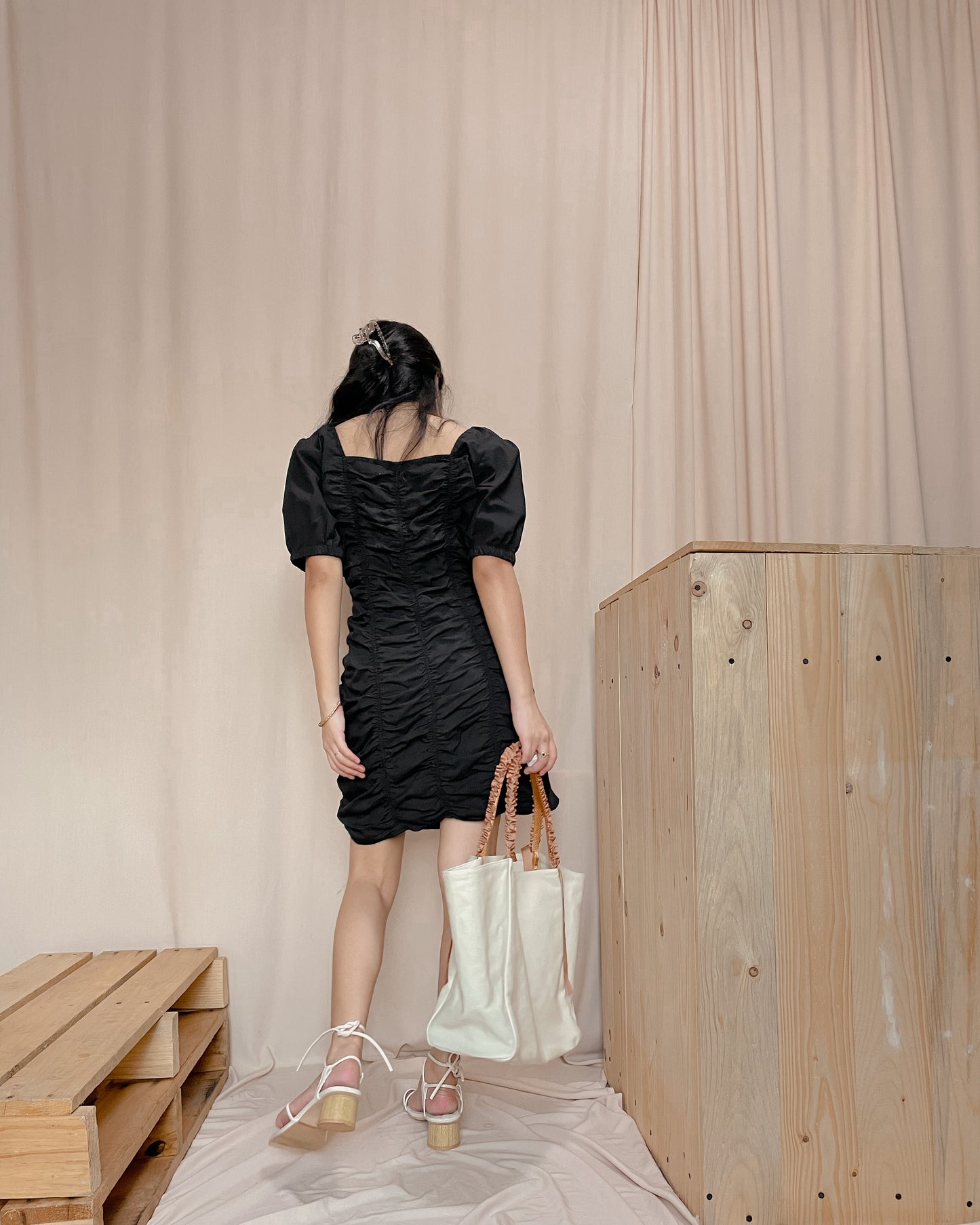 Black body hugging with ruching front design puff sleeve dress