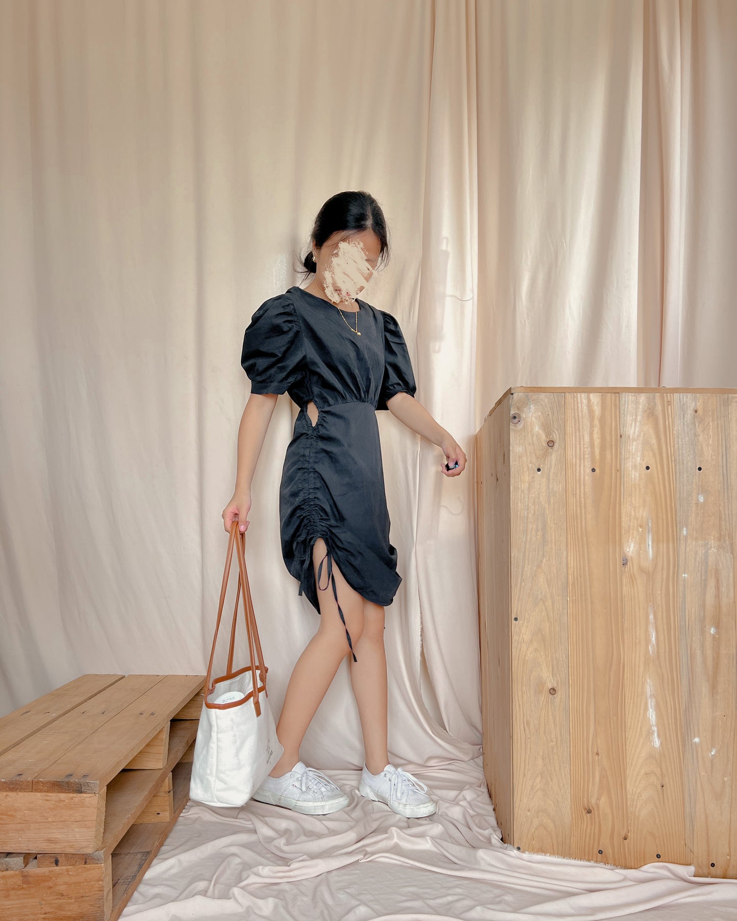 black mini dress with side reveal
