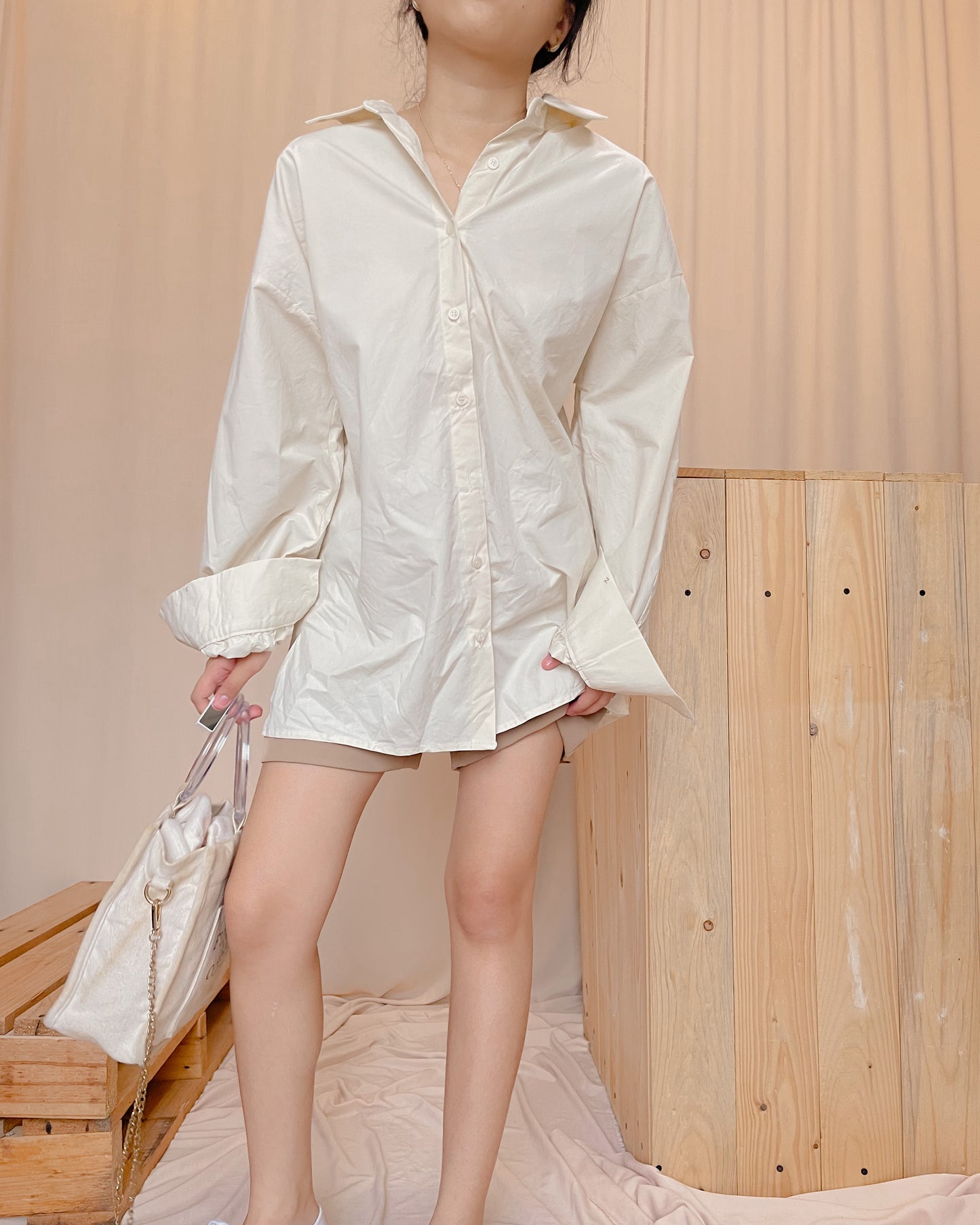 Egg yellow colored, smooth finished backless top with long sleeves