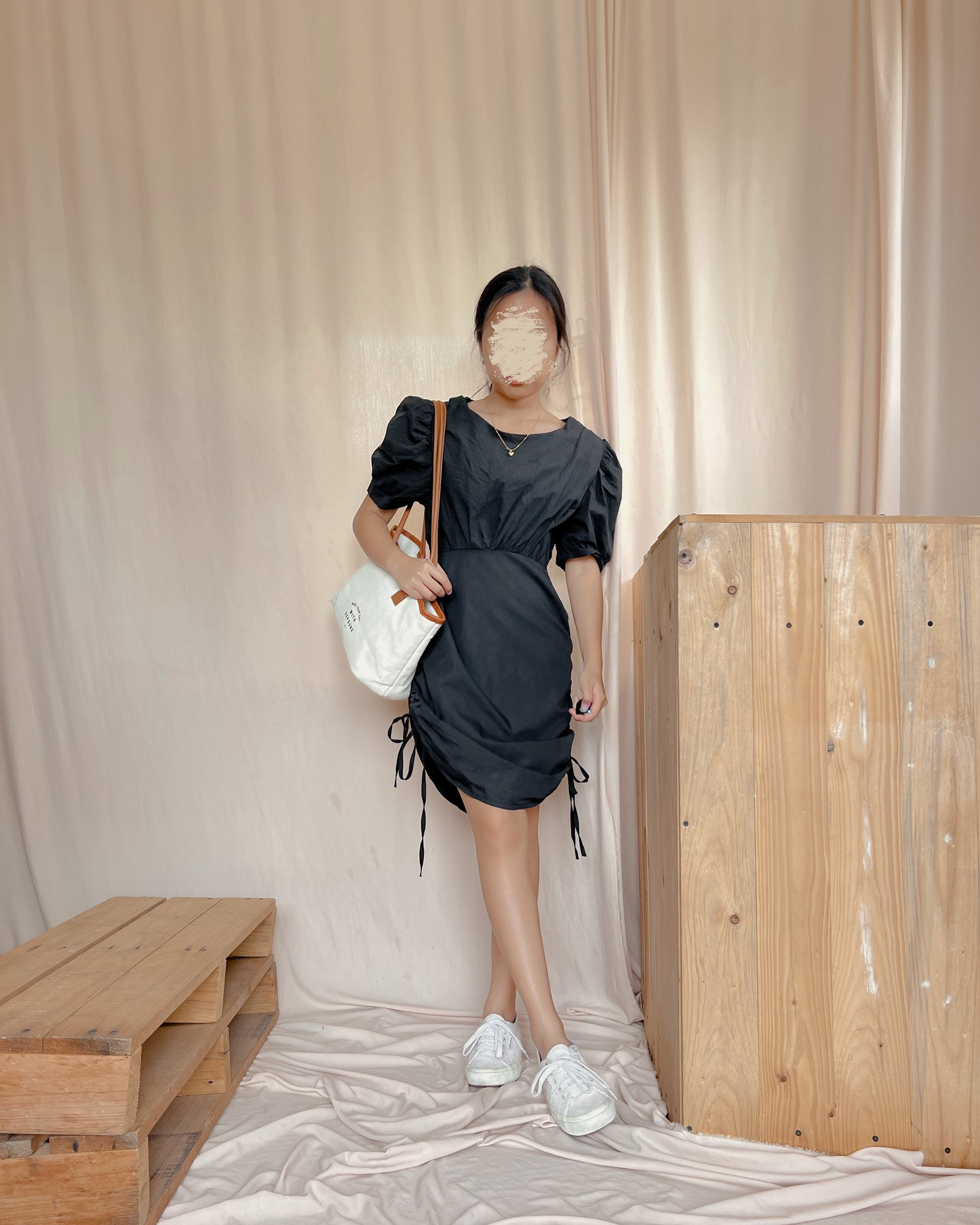 black mini dress with side reveal