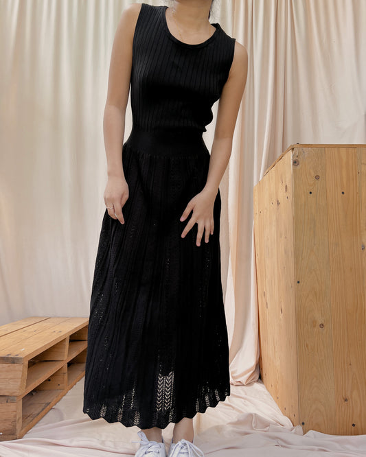gu black knitted dress with cinched waist