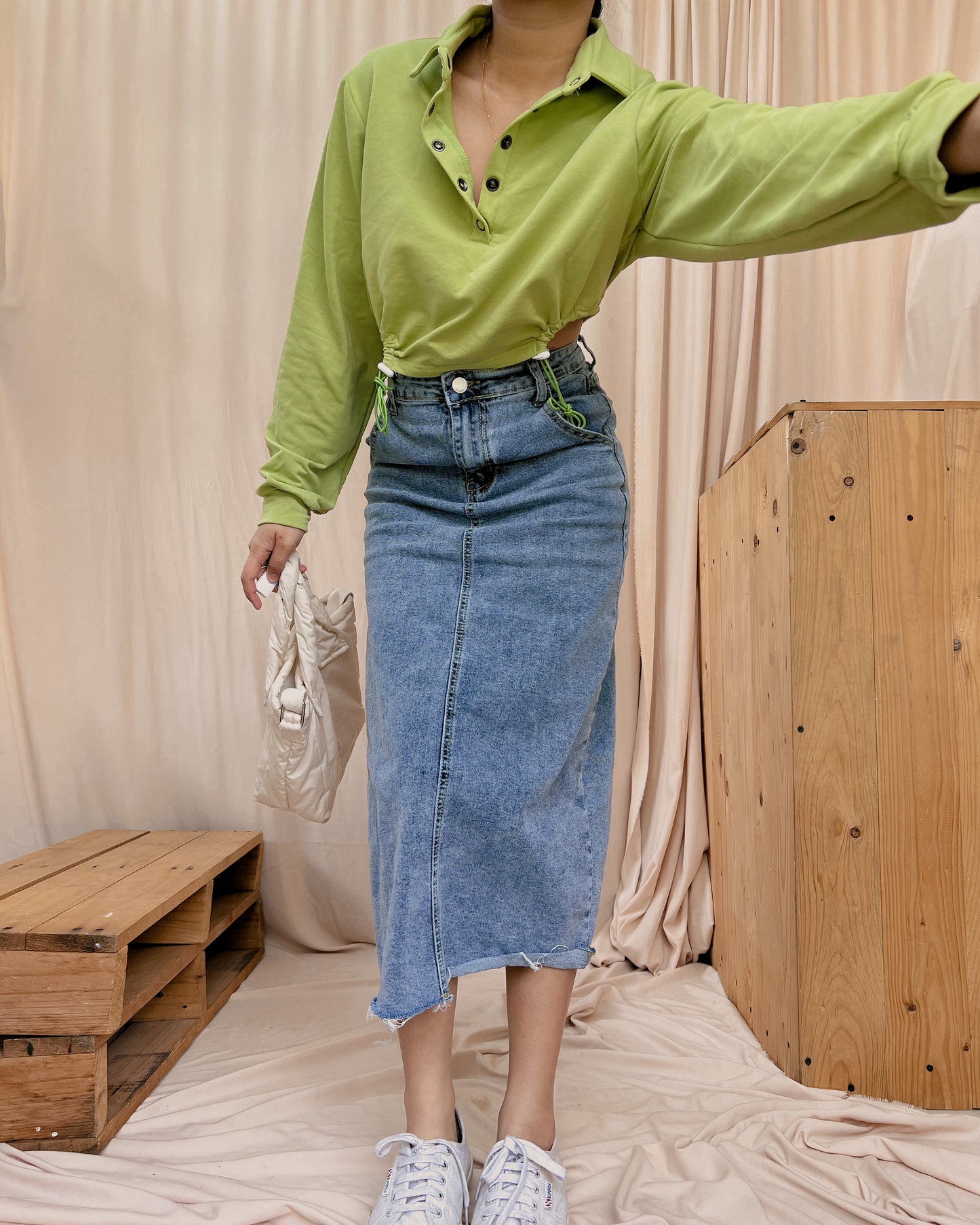 avocado green collared pullover with side cinched cut out