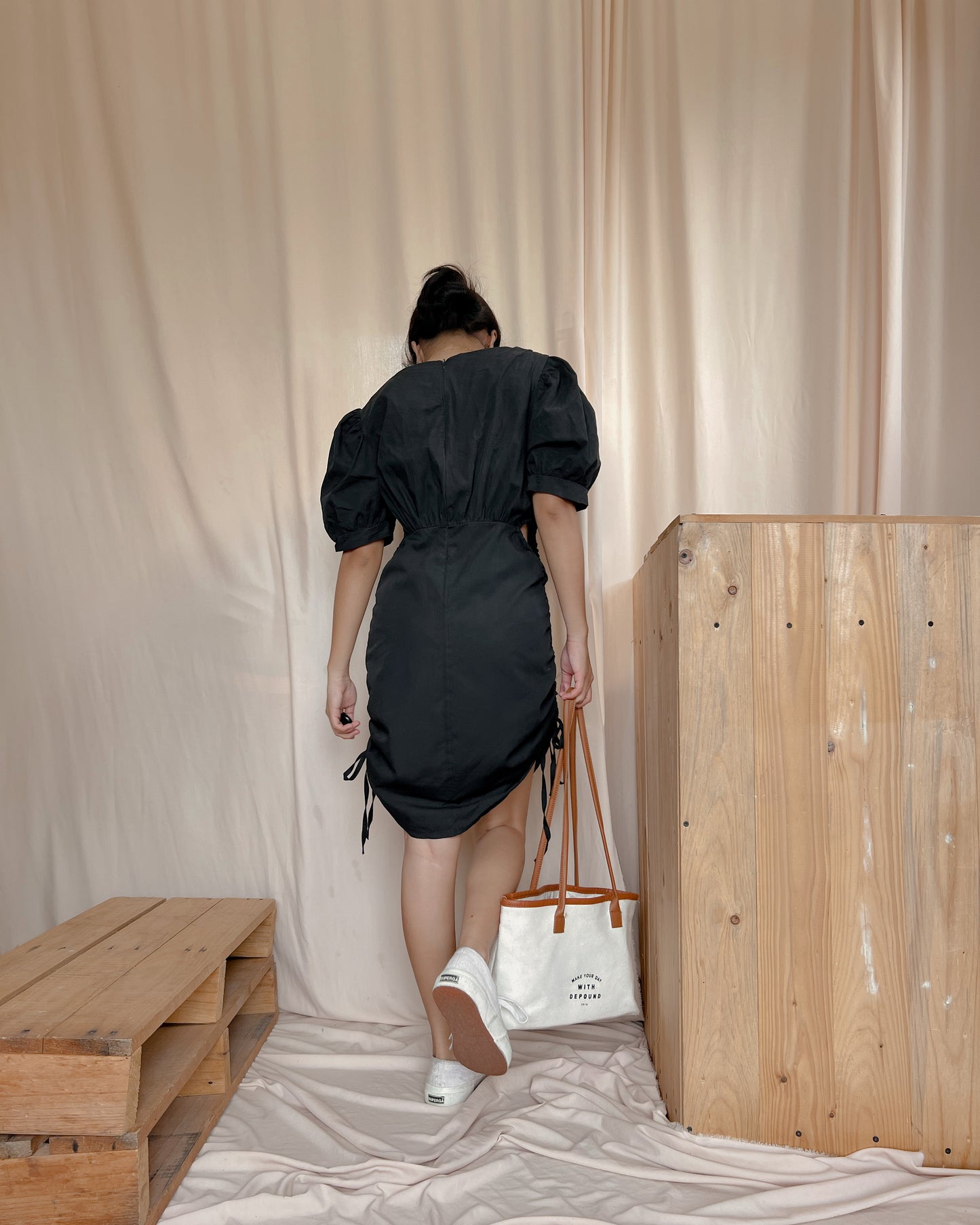 black mini dress with side reveal
