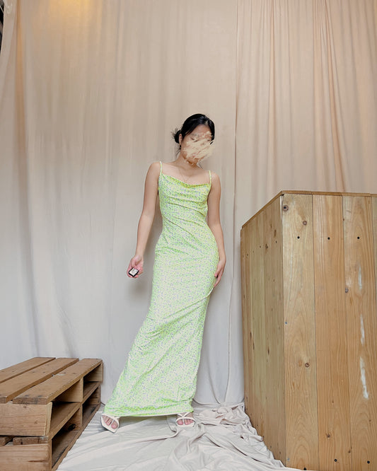 yellow body hugging floral maxi dress