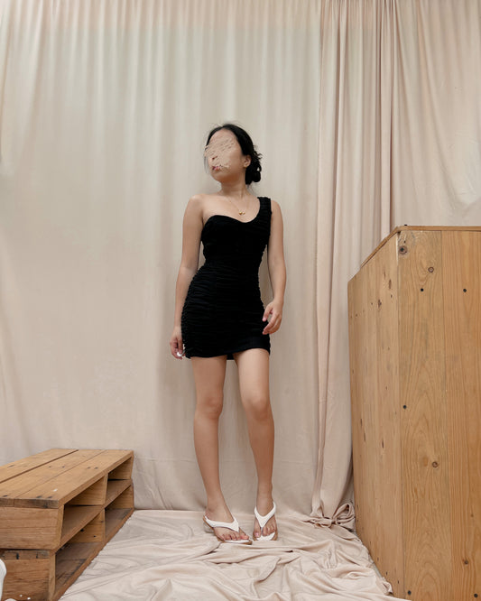 black body hugging dress with venus cut curved bust design