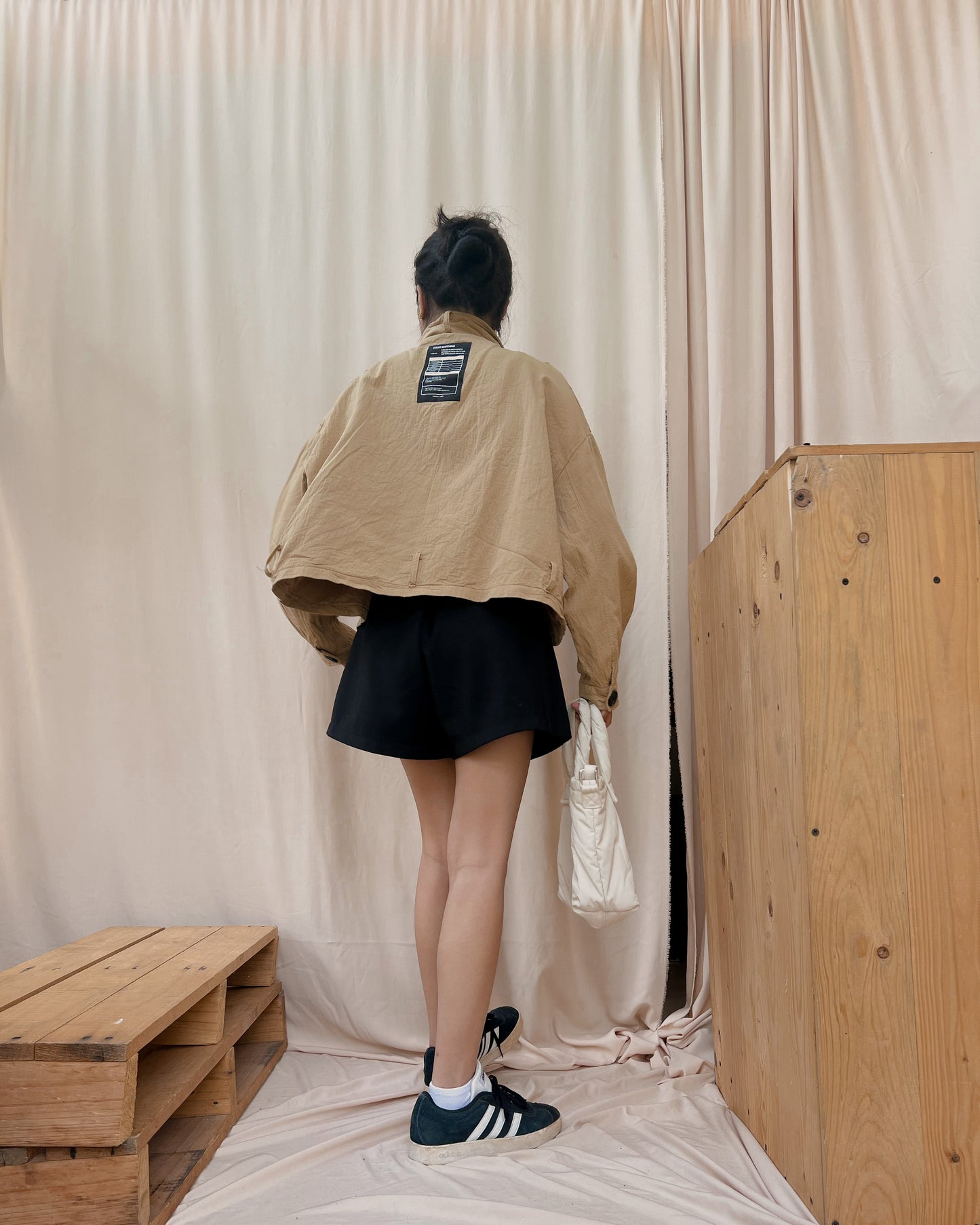 98. brown zip up jacket