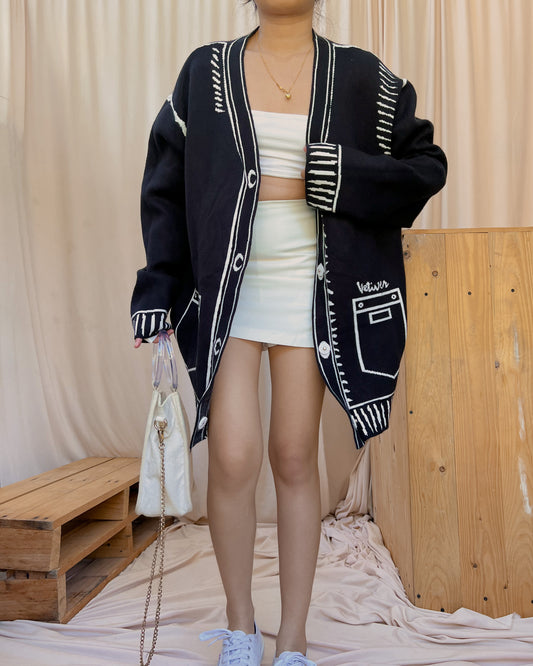black and white cartoonish cardigan