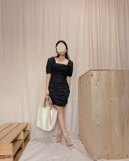 Black body hugging with ruching front design puff sleeve dress