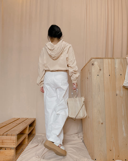 Nude hoodie jacket with ripped sleeve design