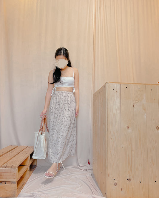 63. cream colored skirt with floral print design A28