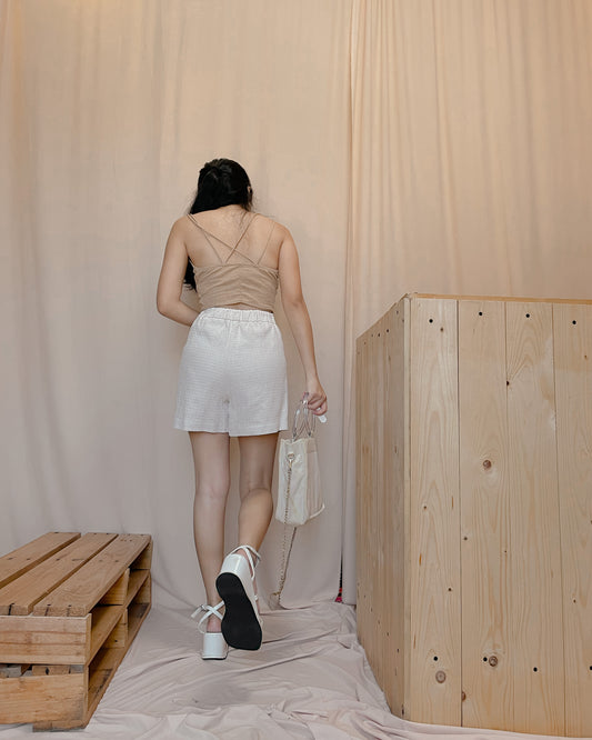 27. white textured shorts B23