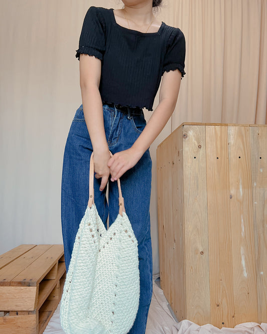black square neck ribbed knit top with curled hemline